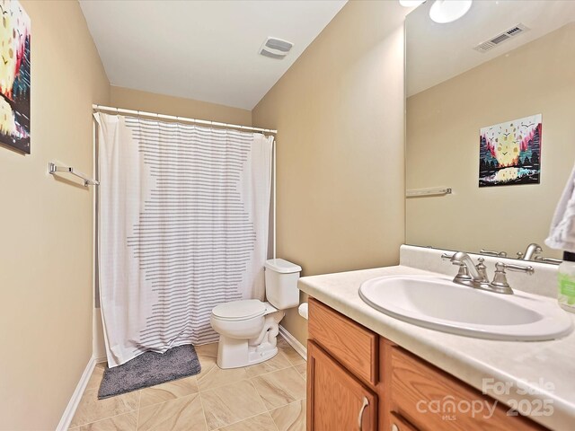 full bath featuring baseboards, visible vents, toilet, and vanity