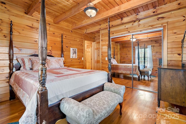 3110 Mentink Way, Nebo, NC 28761 - bedroom with wood ceiling with exposed beams, wood finished floors, and wooden walls