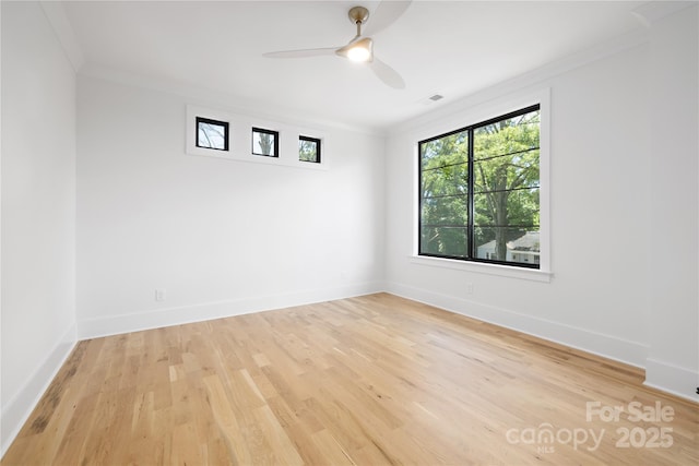 554 W Cama St, Charlotte, NC 28217 - spare room featuring ornamental molding, ceiling fan, light wood-type flooring, and baseboards