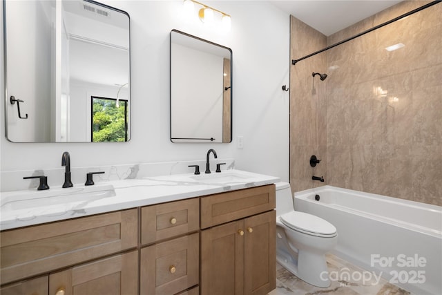 554 W Cama St, Charlotte, NC 28217 - bathroom featuring double vanity, shower / bath combination, and toilet