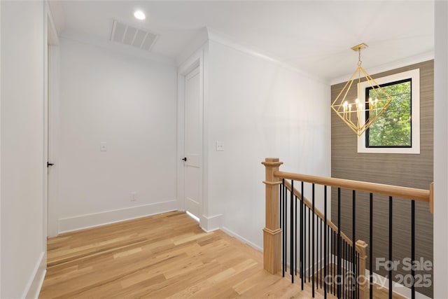 554 W Cama St, Charlotte, NC 28217 - corridor featuring an upstairs landing, a chandelier, light wood-type flooring, baseboards, and recessed lighting