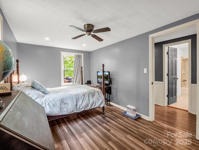 125 Snug Harbor Cir, Lake Lure, NC 28746 - bedroom featuring wood finished floors, a textured ceiling, recessed lighting, a ceiling fan, and baseboards
