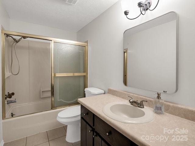 125 Snug Harbor Cir, Lake Lure, NC 28746 - bathroom with tile patterned flooring, toilet, bath / shower combo with glass door, and vanity