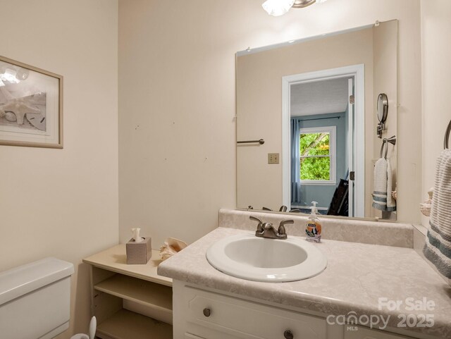 125 Snug Harbor Cir, Lake Lure, NC 28746 - bathroom featuring toilet and vanity