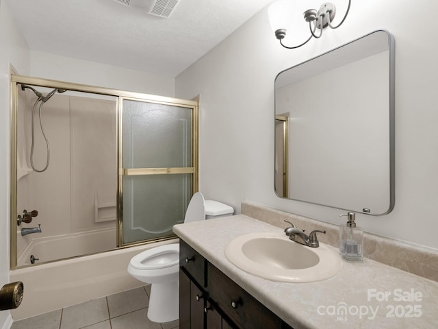 125 Snug Harbor Cir, Lake Lure, NC 28746 - full bath featuring toilet, tile patterned flooring, vanity, and bath / shower combo with glass door
