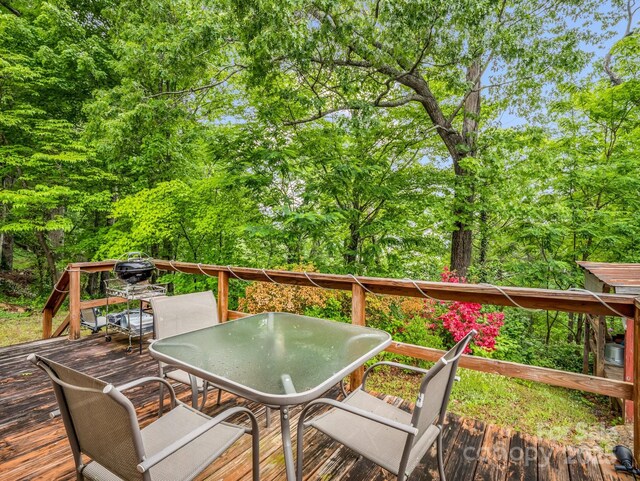 125 Snug Harbor Cir, Lake Lure, NC 28746 - wooden deck with outdoor dining space