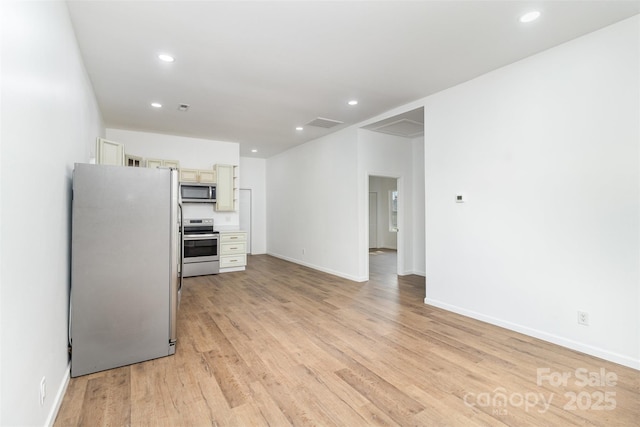 555 Pryor St, Chester, SC 29706 - kitchen with stainless steel appliances, baseboards, recessed lighting, and light wood finished floors