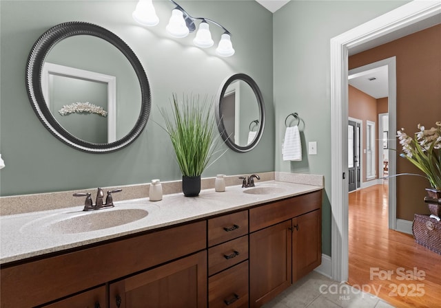 860 Arrow Point Ln, Davidson, NC 28036 - bathroom featuring double vanity, a sink, and tile patterned floors