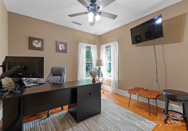 860 Arrow Point Ln, Davidson, NC 28036 - office with light wood-type flooring, visible vents, ceiling fan, and baseboards