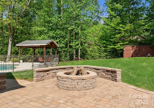 860 Arrow Point Ln, Davidson, NC 28036 - view of patio / terrace with a fenced in pool, fence, a gazebo, and an outdoor fire pit