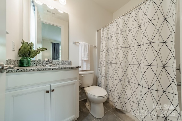 full bathroom featuring vanity, toilet, tile patterned floors, a shower with shower curtain, and visible vents