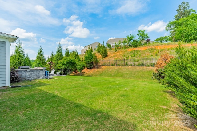 view of yard featuring fence