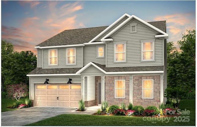 12017 Grinstead Ln Unit 301, Charlotte, NC 28278 - view of front of property with an attached garage, driveway, stone siding, and a shingled roof