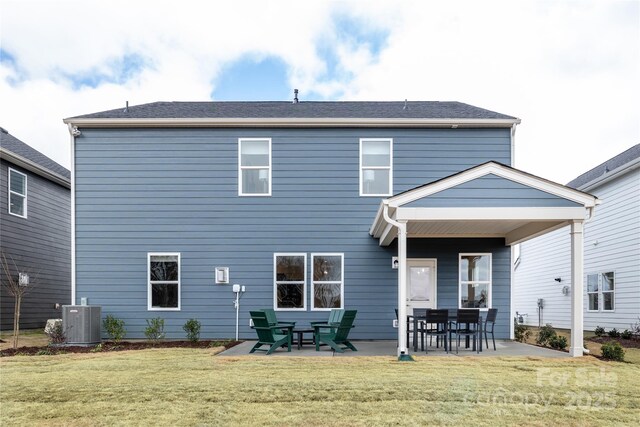 12017 Grinstead Ln Unit 301, Charlotte, NC 28278 - back of house featuring central AC, a yard, and a patio