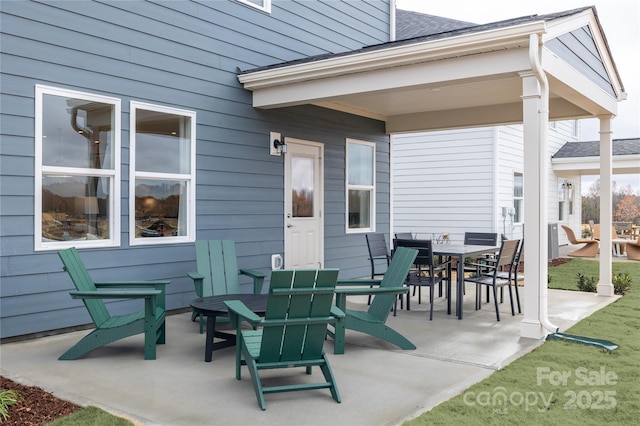 12017 Grinstead Ln Unit 301, Charlotte, NC 28278 - view of patio / terrace featuring outdoor dining area