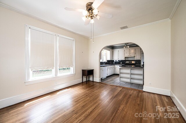 625 2nd St NE, Hickory, NC 28601 - kitchen featuring a ceiling fan, stainless steel range with gas stovetop, arched walkways, dishwasher, and ornamental molding