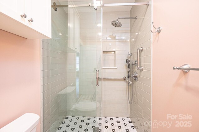 625 2nd St NE, Hickory, NC 28601 - full bathroom with toilet and a stall shower