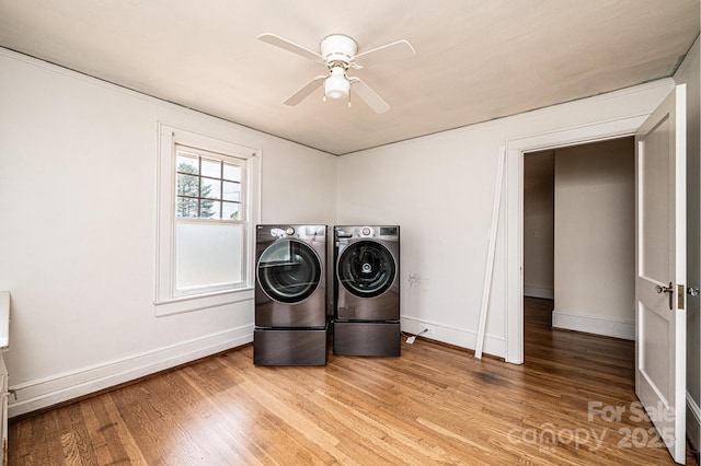 625 2nd St NE, Hickory, NC 28601 - washroom featuring washer and clothes dryer, light wood-type flooring, baseboards, and ceiling fan