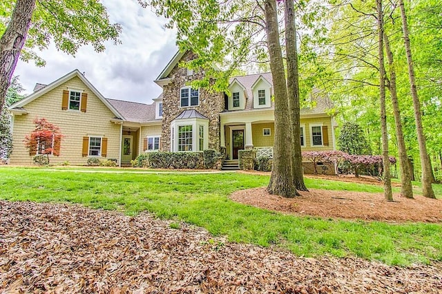 3400 Baucom Manor Rd, Monroe, NC 28110 - craftsman inspired home featuring a front lawn and a standing seam roof