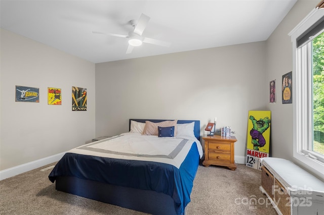 bedroom featuring carpet, baseboards, and ceiling fan