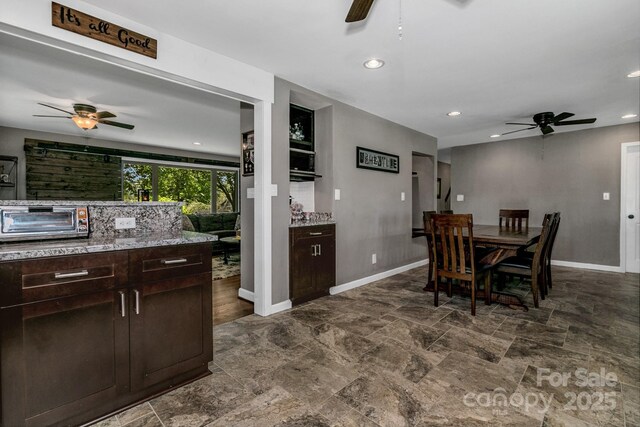 dining space featuring a toaster, baseboards, a ceiling fan, and recessed lighting