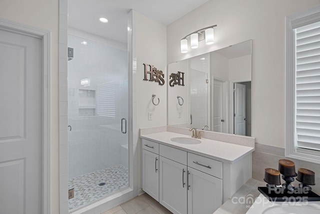 full bathroom featuring a shower stall, vanity, and recessed lighting