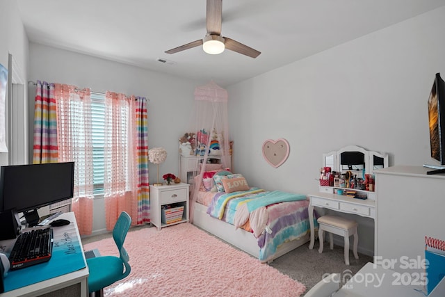 carpeted bedroom with a ceiling fan