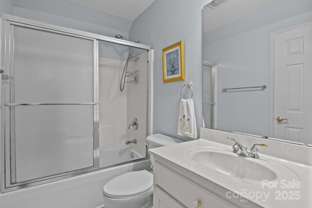 bathroom with enclosed tub / shower combo, toilet, visible vents, and vanity