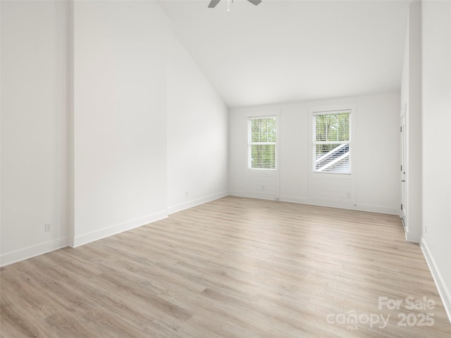 23 Heartleaf Cir, Arden, NC 28704 - spare room with ceiling fan, lofted ceiling, light wood-type flooring, and baseboards
