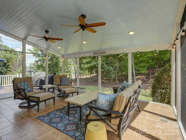 view of patio with ceiling fan and outdoor lounge area