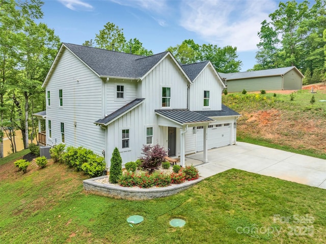 modern inspired farmhouse with board and batten siding, central AC, driveway, and a shingled roof