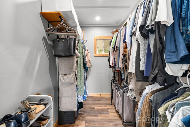 spacious closet with wood finished floors