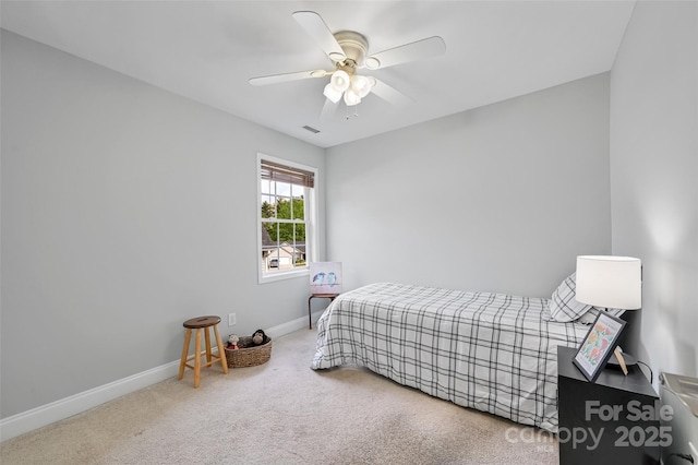 bedroom featuring baseboards, ceiling fan, carpet flooring, and visible vents