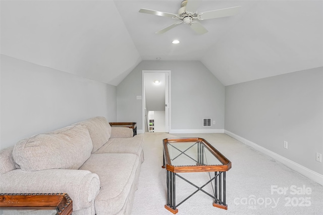 living room featuring ceiling fan, carpet, baseboards, lofted ceiling, and visible vents