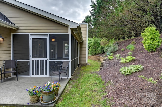 view of yard featuring a sunroom