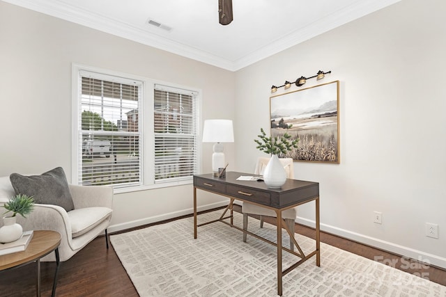 office area featuring wood finished floors, visible vents, and baseboards