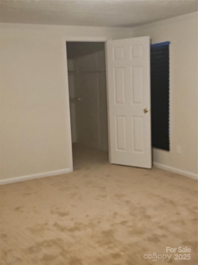 112 Thunder Rd, China Grove, NC 28023 - unfurnished bedroom with light carpet and baseboards