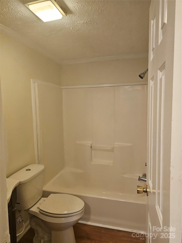 112 Thunder Rd, China Grove, NC 28023 - full bathroom featuring shower / bathing tub combination, wood finished floors, a textured ceiling, and toilet