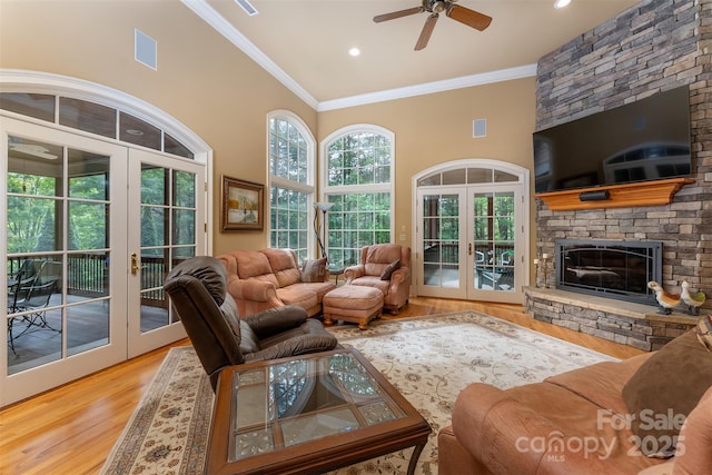 168 Chattooga Run, Hendersonville, NC 28739 - living area featuring french doors, ceiling fan, wood finished floors, ornamental molding, and a towering ceiling