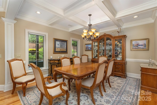 168 Chattooga Run, Hendersonville, NC 28739 - dining area featuring light wood-style floors, a chandelier, beam ceiling, coffered ceiling, and baseboards
