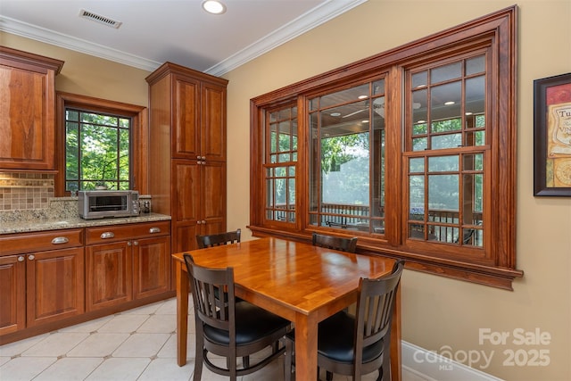 168 Chattooga Run, Hendersonville, NC 28739 - dining space with ornamental molding, recessed lighting, and light flooring