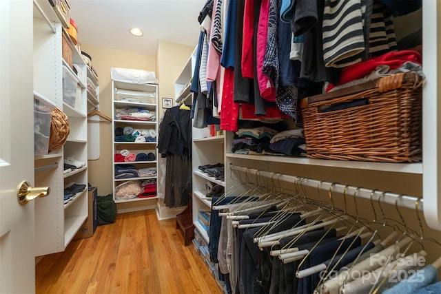 168 Chattooga Run, Hendersonville, NC 28739 - spacious closet featuring wood finished floors