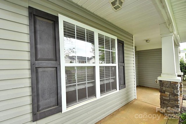 view of patio featuring a porch