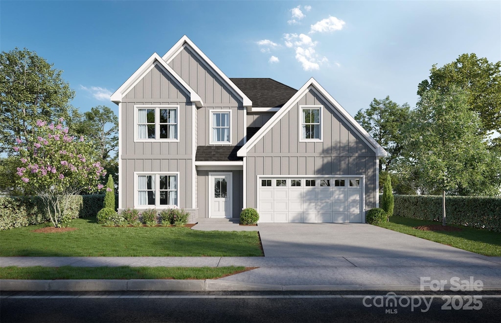 modern farmhouse style home featuring concrete driveway, a front yard, board and batten siding, and a shingled roof