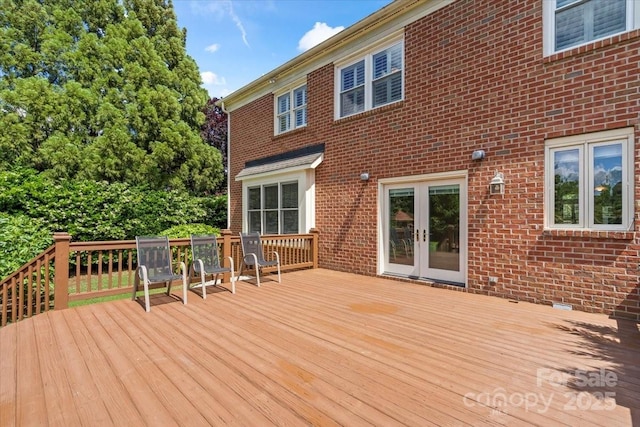 wooden terrace featuring french doors