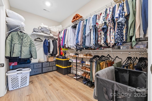 12705 Twilight Dr, Mint Hill, NC 28227 - walk in closet with visible vents and wood finished floors