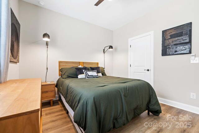 12705 Twilight Dr, Mint Hill, NC 28227 - bedroom featuring baseboards, ceiling fan, and light wood-type flooring