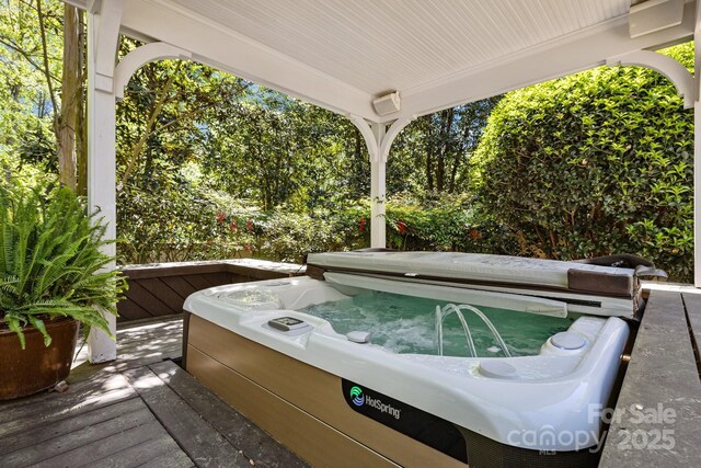 6914 Riesman Ln Unit 95, Charlotte, NC 28210 - view of patio / terrace featuring a hot tub