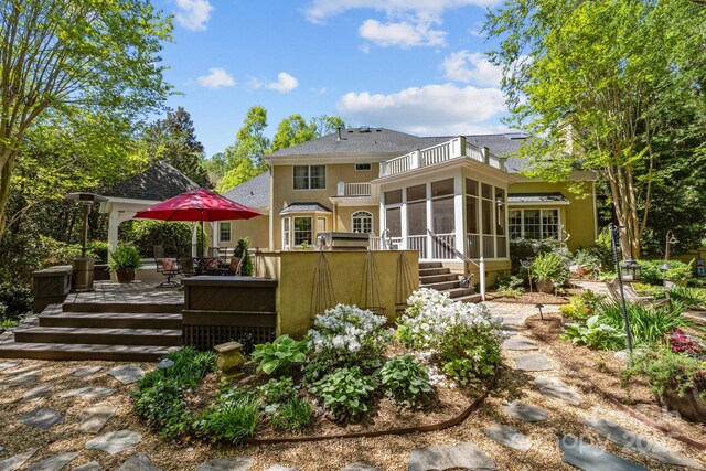 6914 Riesman Ln Unit 95, Charlotte, NC 28210 - back of house with a shingled roof, a balcony, a deck, a sunroom, and stucco siding