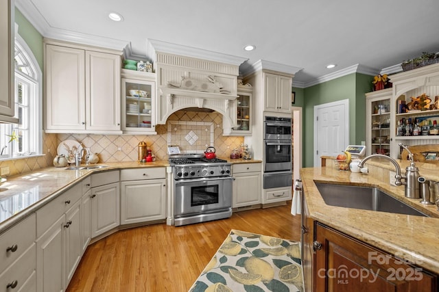 6914 Riesman Ln Unit 95, Charlotte, NC 28210 - kitchen featuring tasteful backsplash, a warming drawer, stainless steel appliances, and a sink